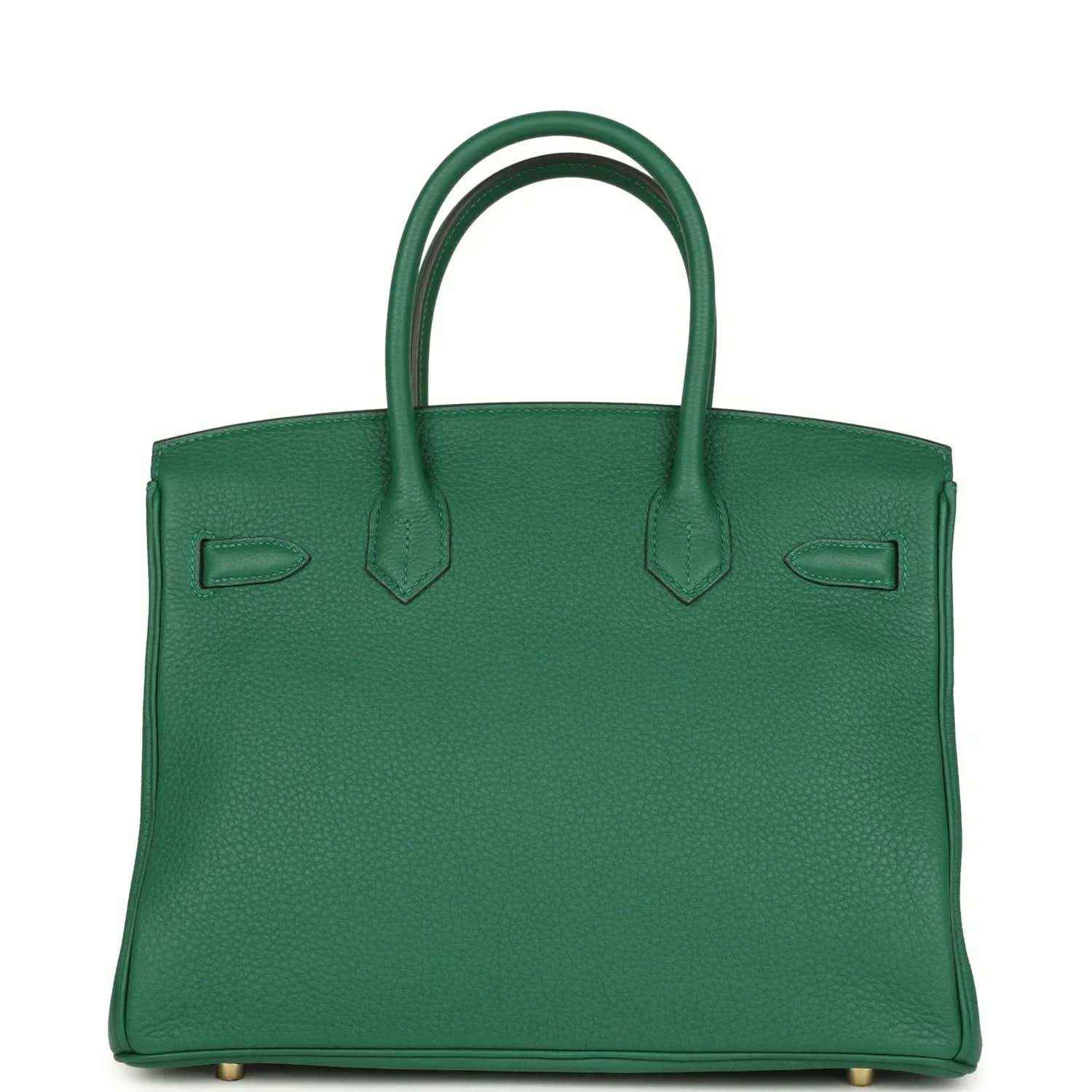Elegant green leather tote bag with timeless, sophisticated design and structured silhouette.