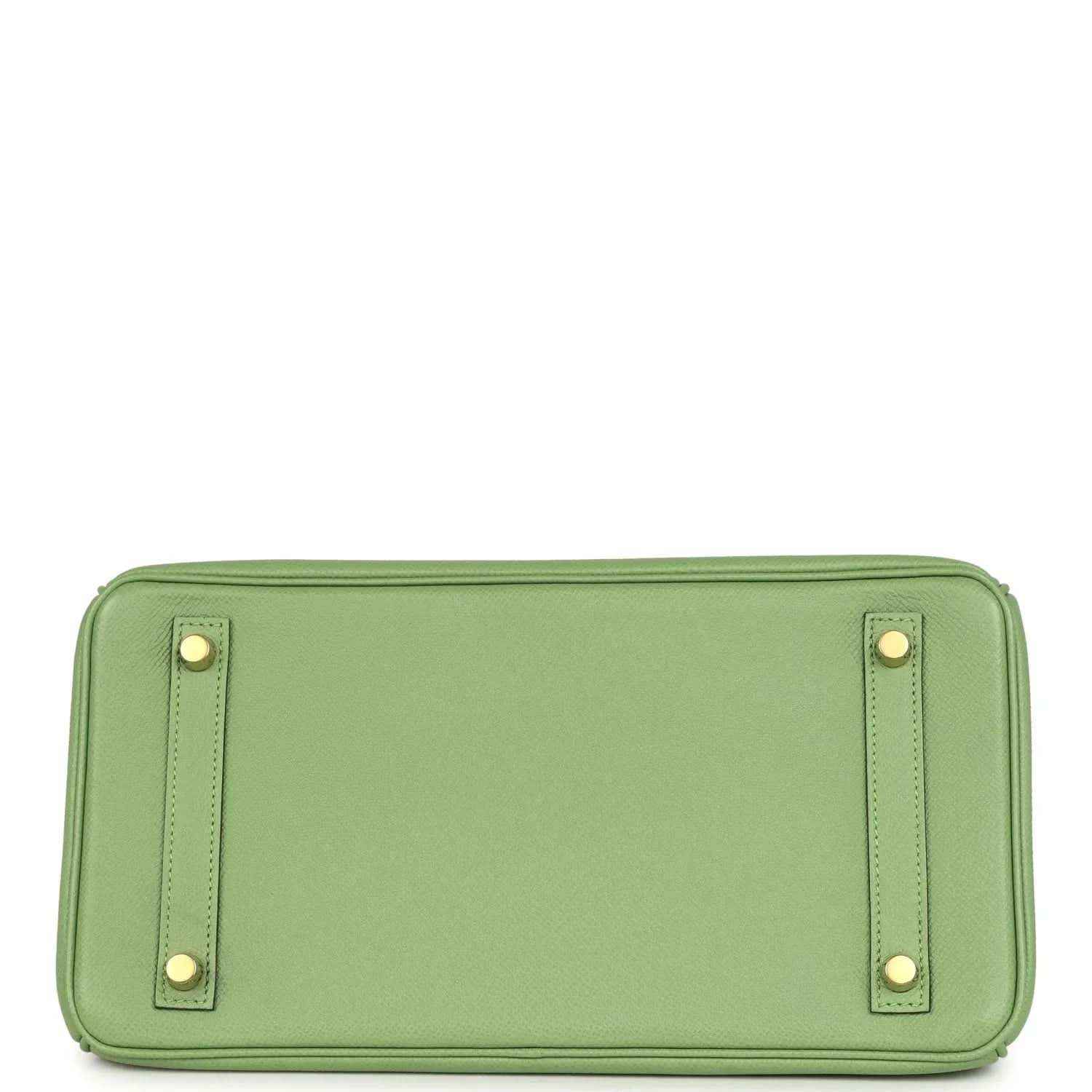 Elegant green leather handbag base with gold tone feet, refined and timeless style