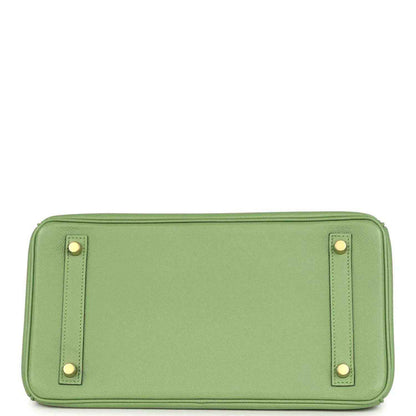 Elegant green leather handbag base with gold tone feet, refined and timeless style