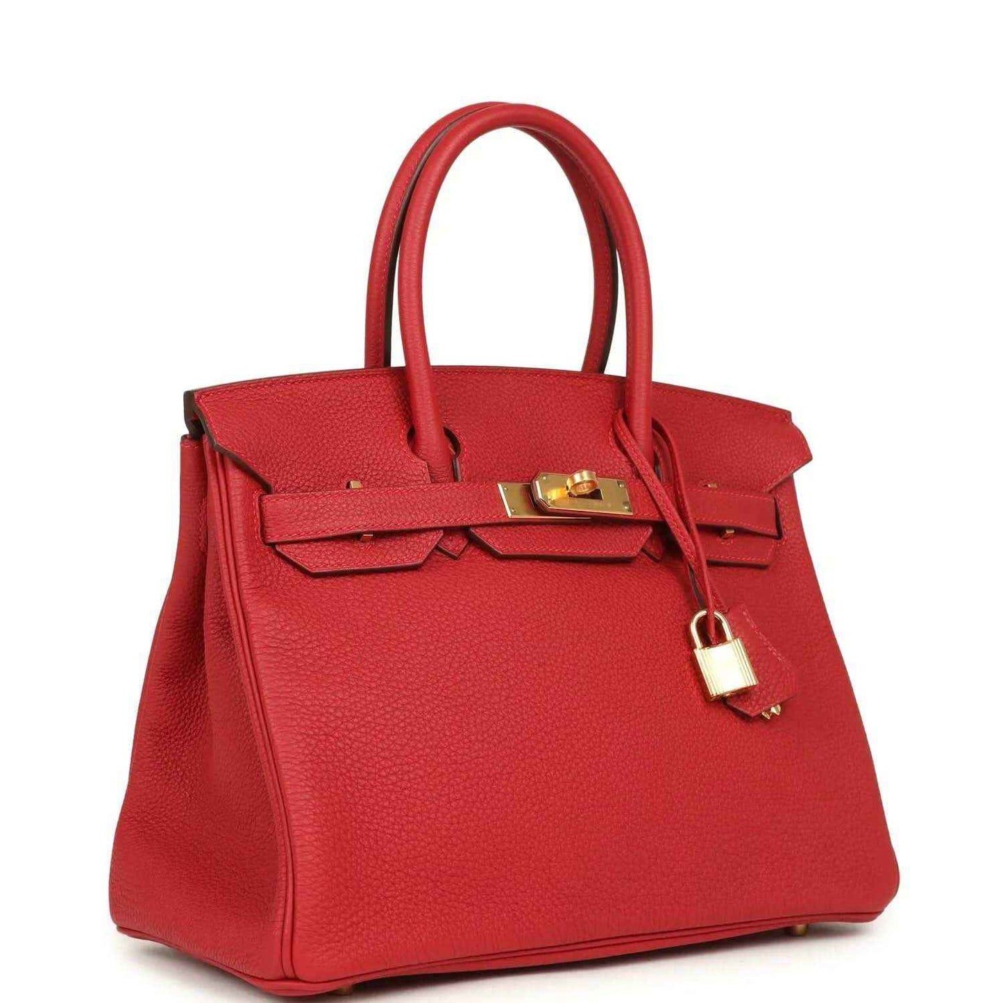 Elegant red leather handbag with gold hardware, timeless and sophisticated style.