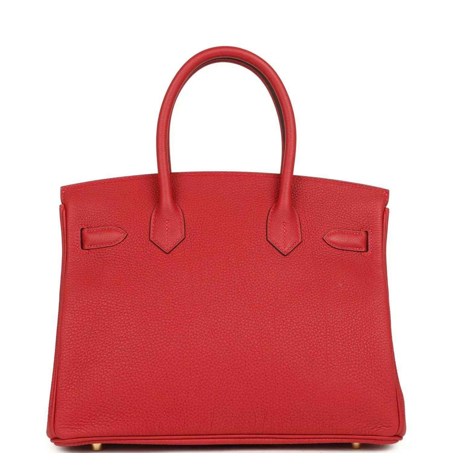 Timeless red leather handbag with elegant textured finish and dual top handles.