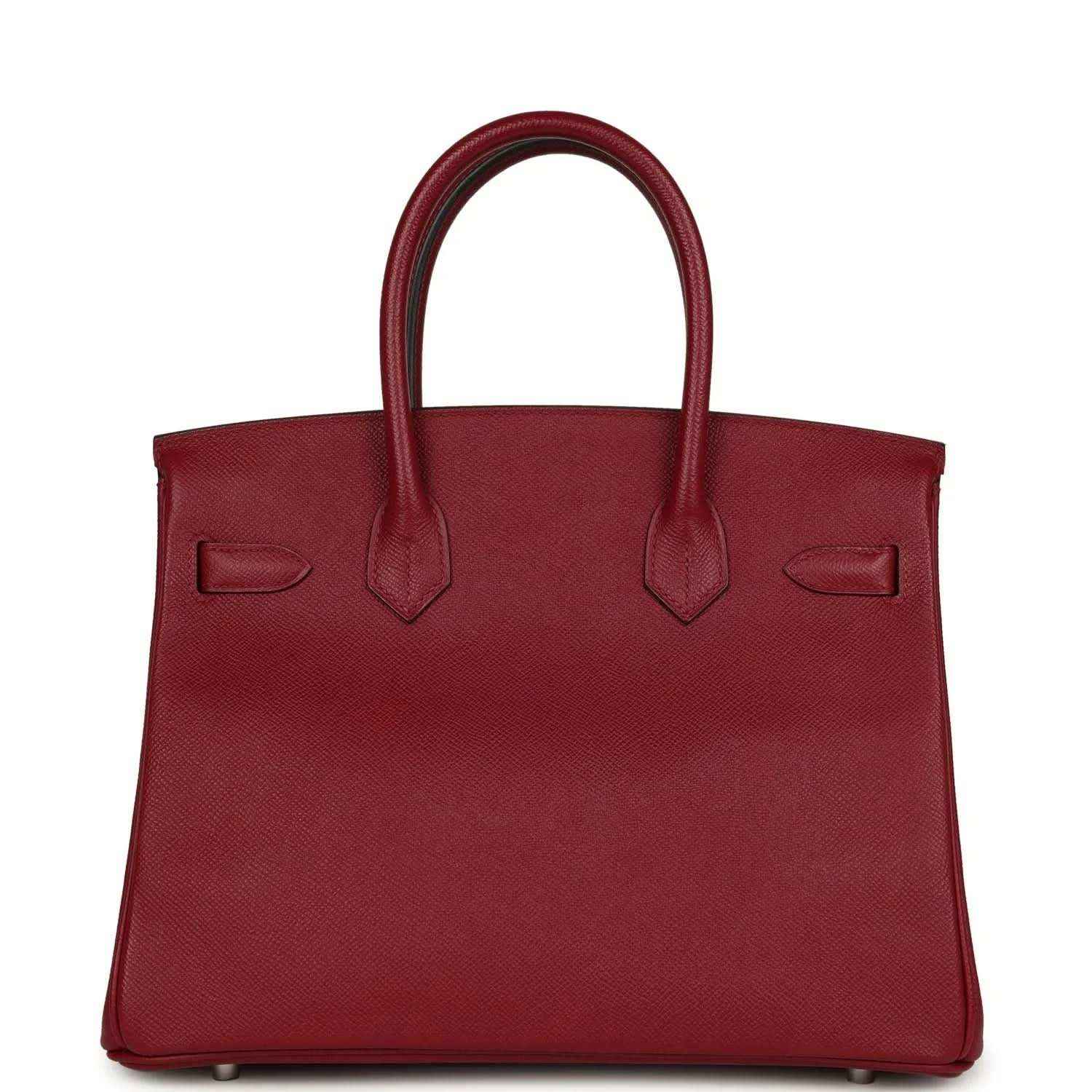 Elegant burgundy leather handbag with a timeless, sophisticated silhouette
