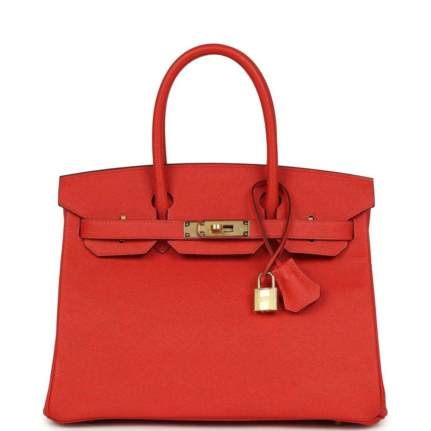 Elegant red leather handbag with gold hardware and a timeless, sophisticated design.