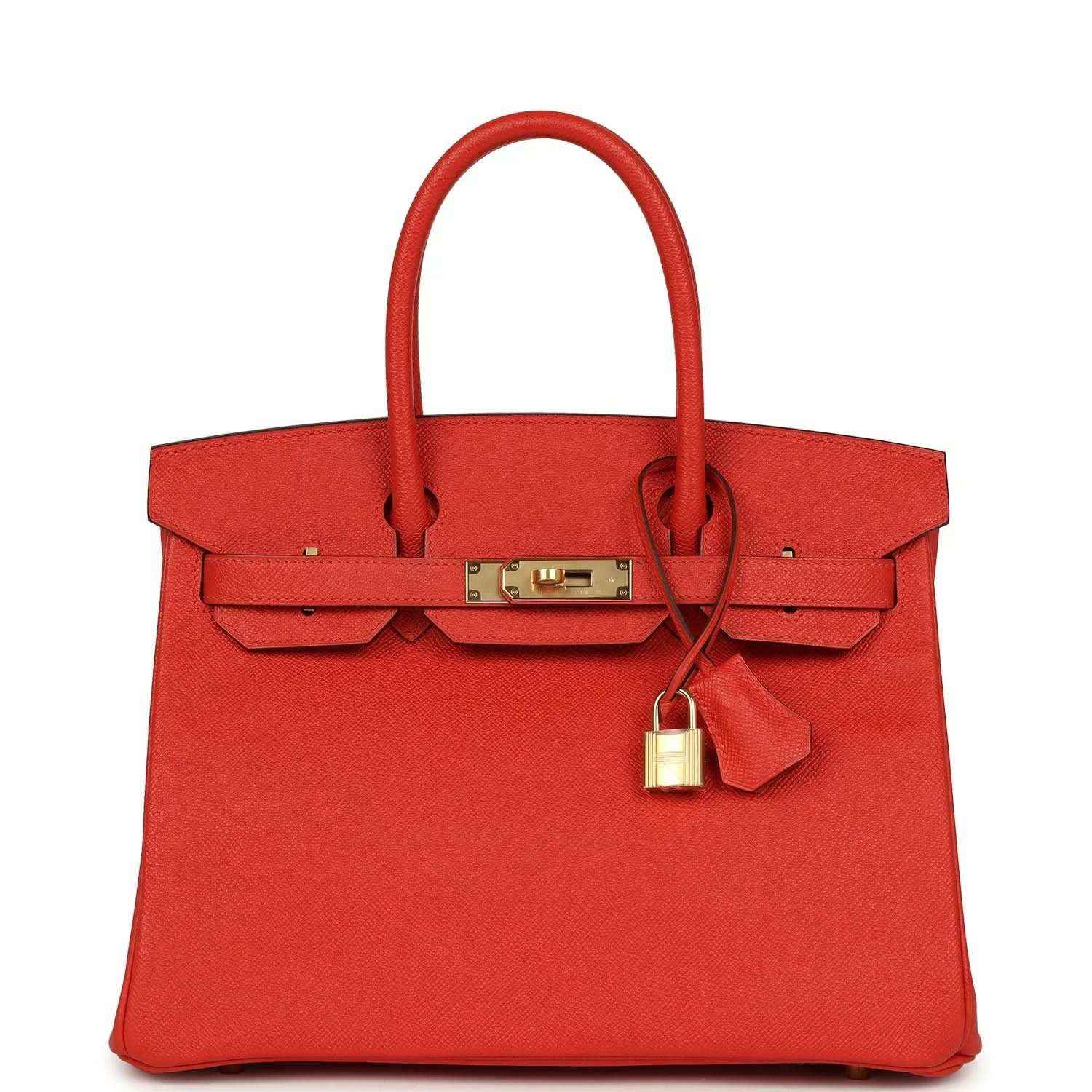 Elegant red leather handbag with gold hardware and a timeless, sophisticated design.