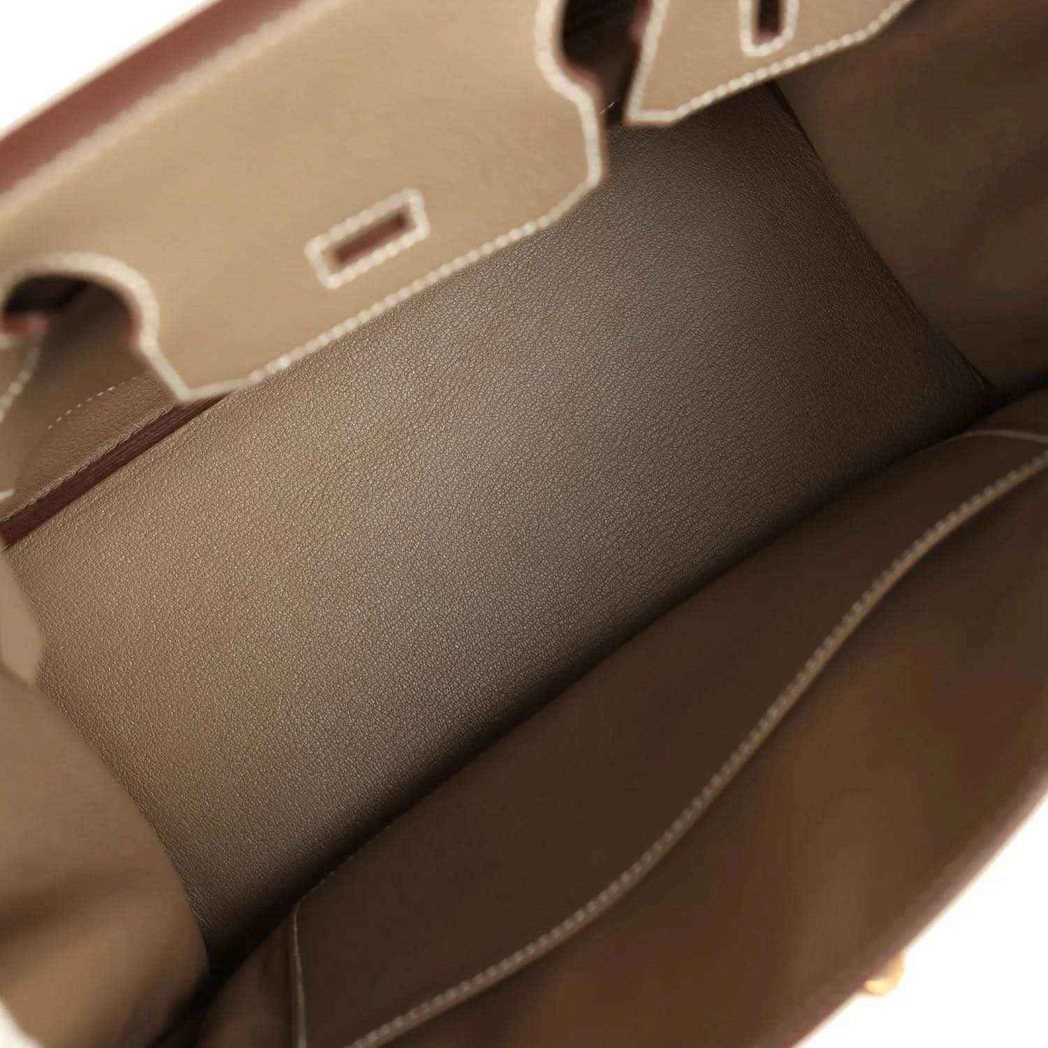 Timeless beige leather tote bag interior with elegant stitching and refined finish.
