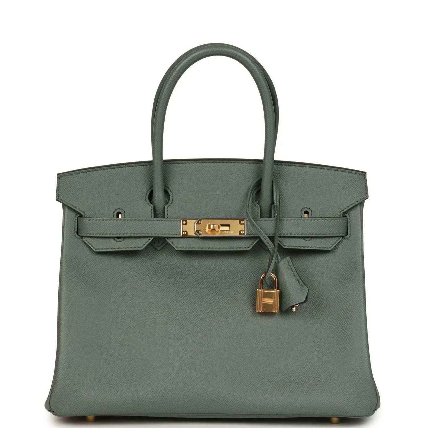 Elegant sage green leather handbag with gold hardware and timeless, sophisticated design.