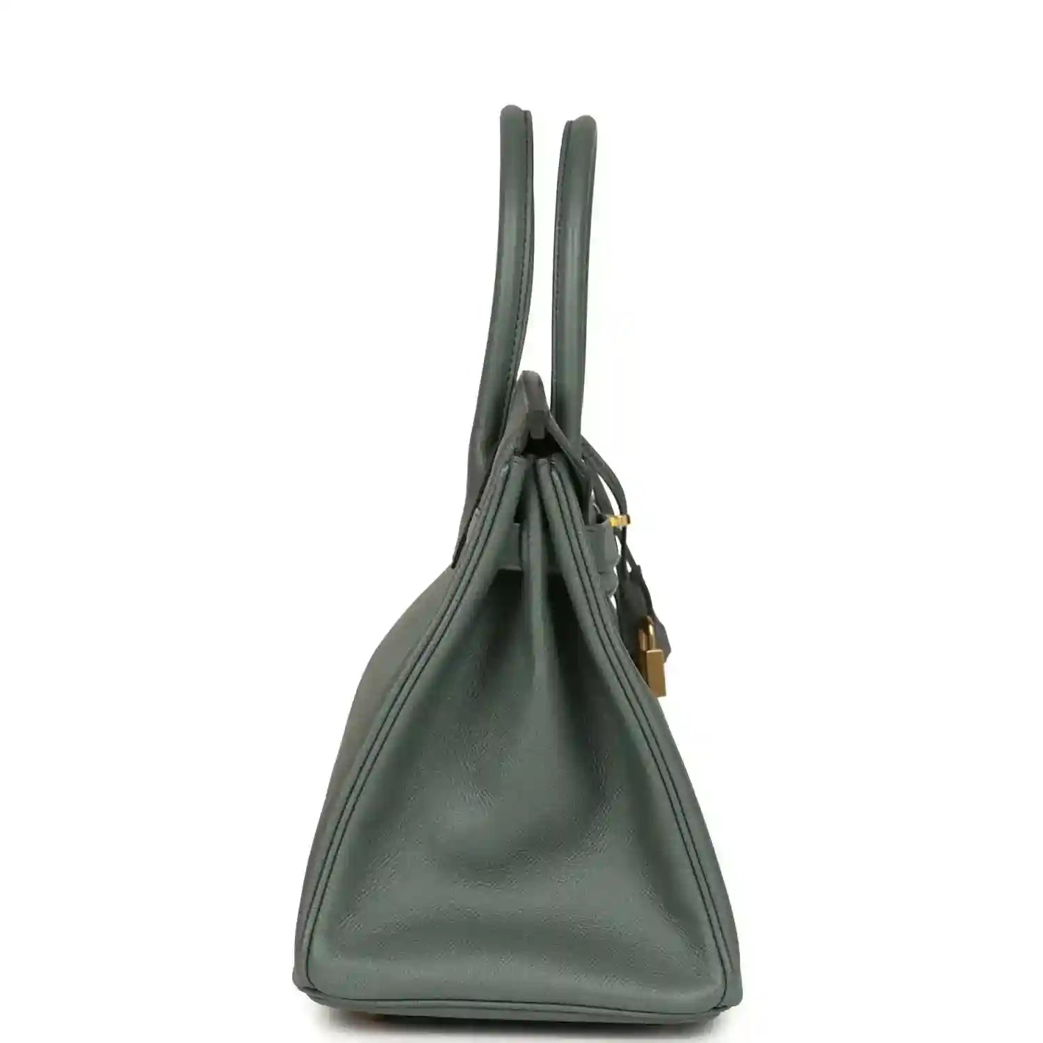 Timeless, elegant green leather handbag with gold accents and a structured silhouette