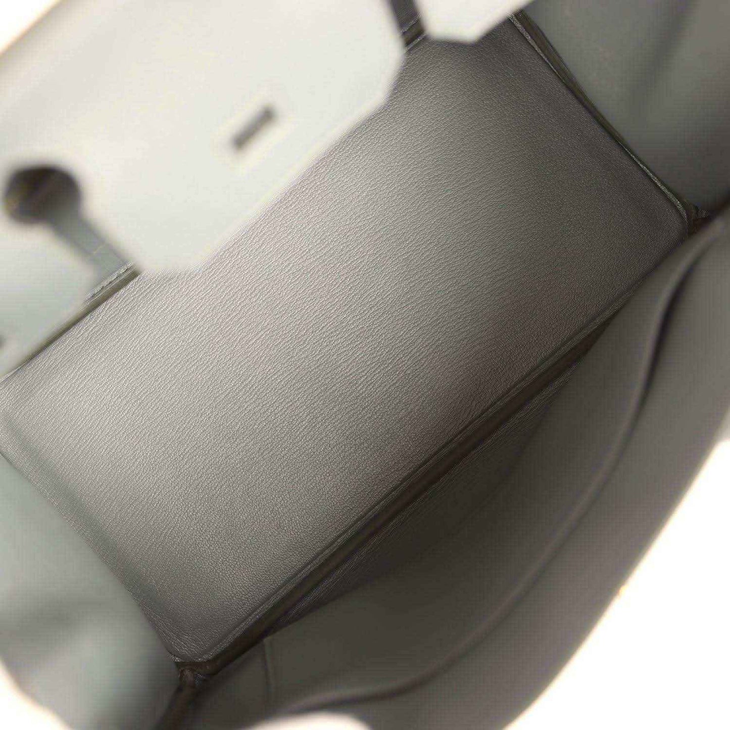 Timeless grey leather handbag interior, elegant and sophisticated design.