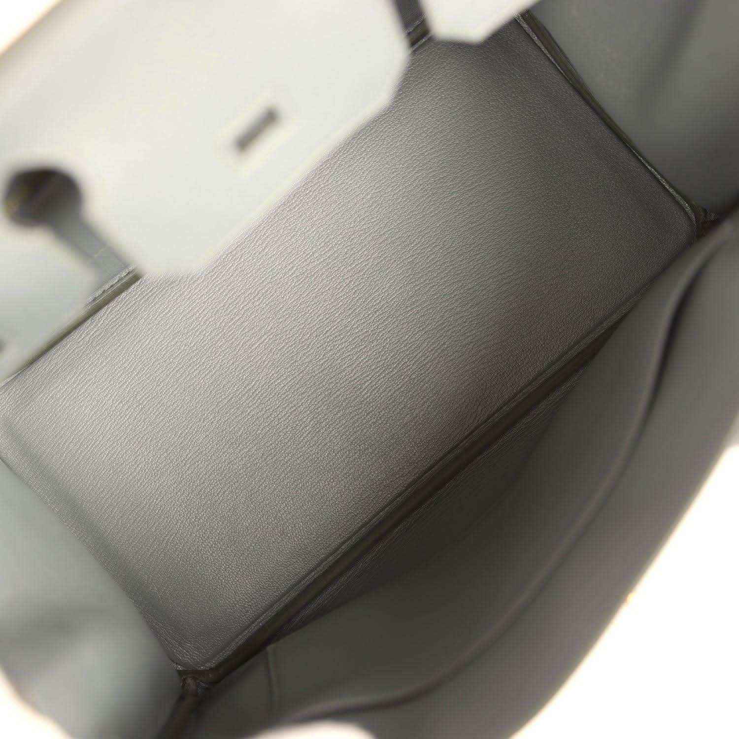 Timeless grey leather handbag interior, elegant and sophisticated design.