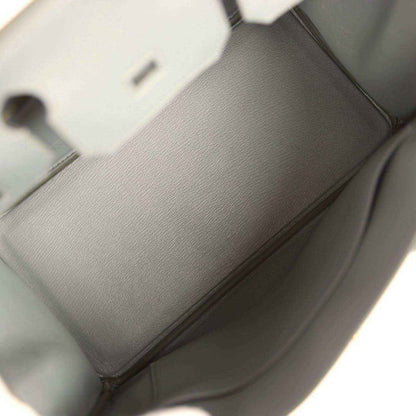 Timeless grey leather handbag interior, elegant and sophisticated design.