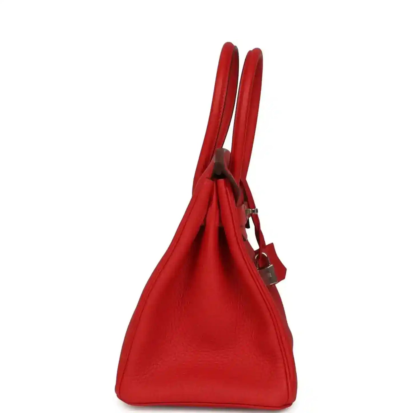 Elegant red leather handbag with a timeless silhouette and sophisticated finish.