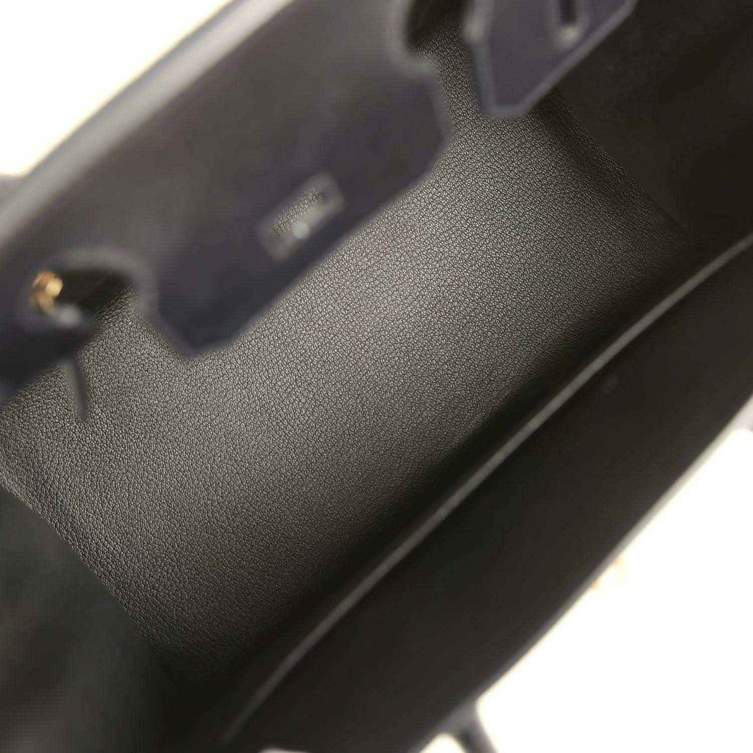 Elegant black leather handbag interior with refined, timeless and sophisticated finish