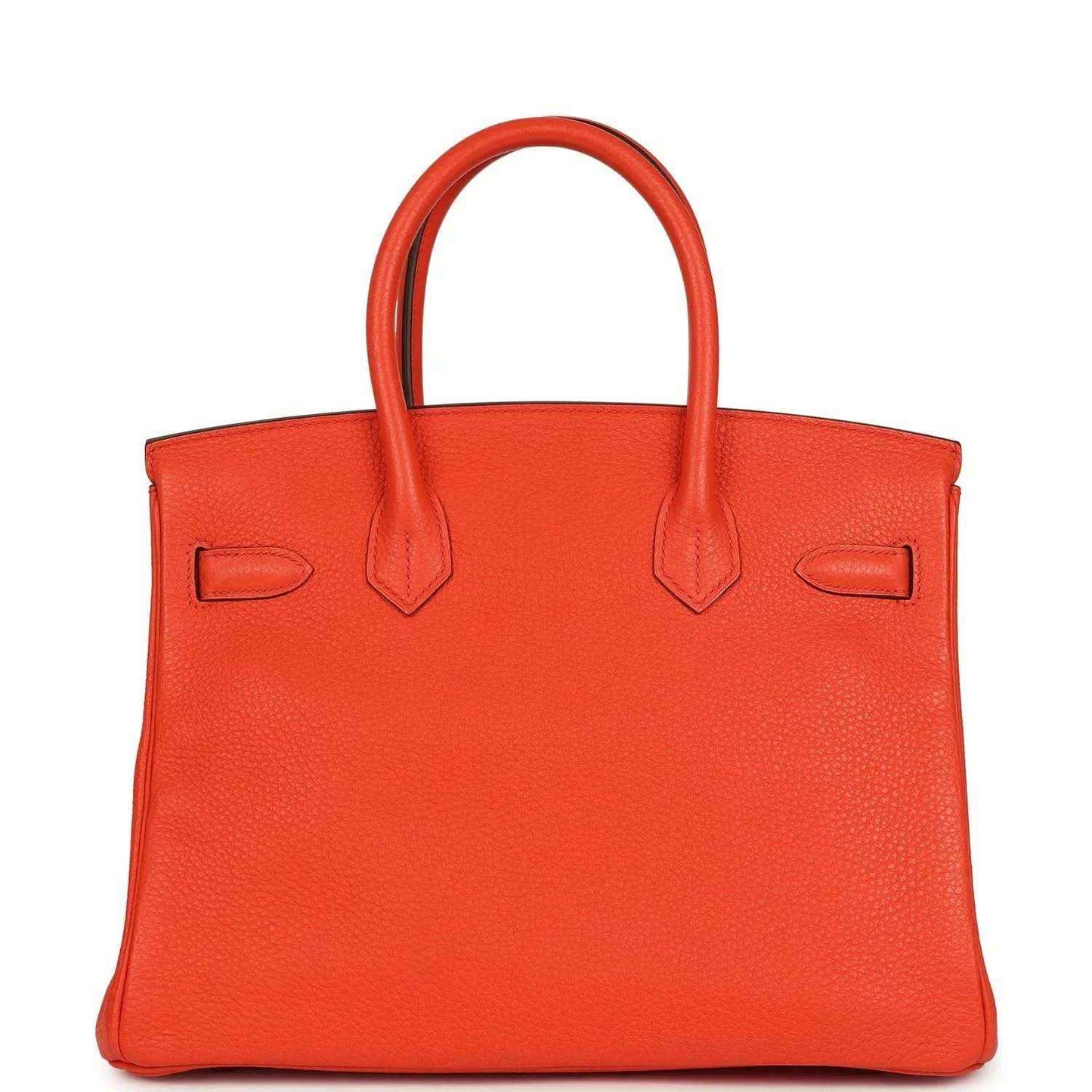 Timeless, elegant orange leather handbag with refined texture and sophisticated silhouette.