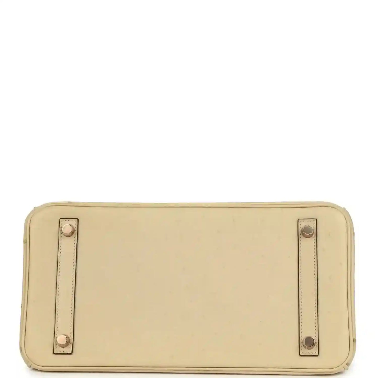 Timeless beige leather handbag base with elegant stitching and gold-tone metal feet.