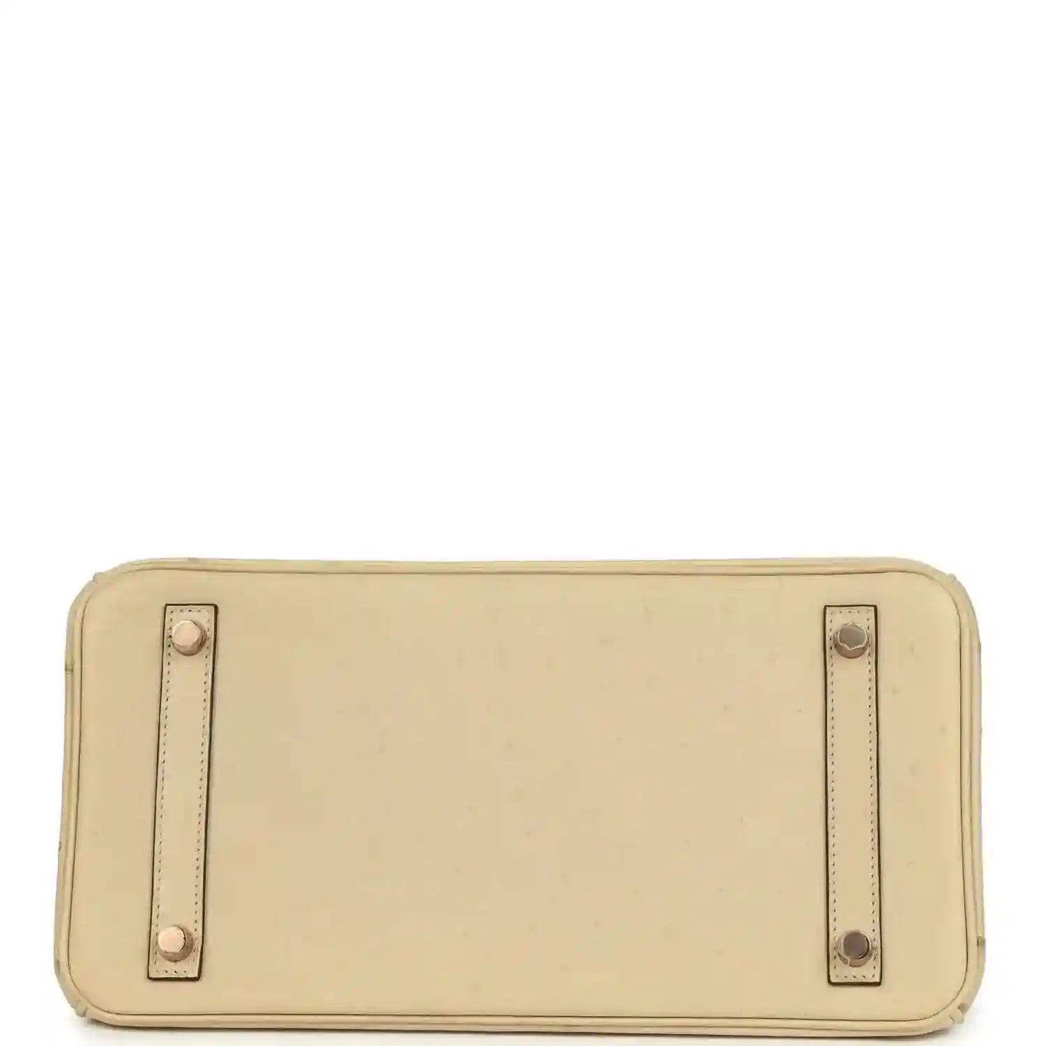 Timeless beige leather handbag base with elegant stitching and gold-tone metal feet.
