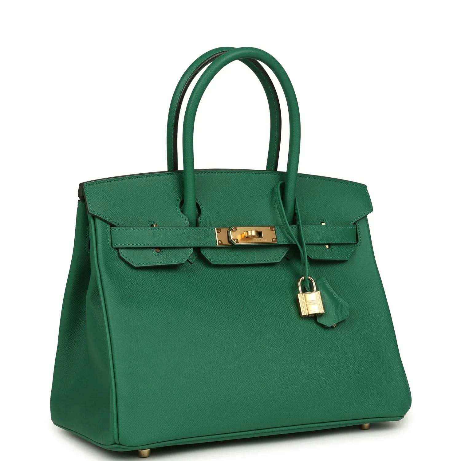 Elegant green leather handbag with gold hardware, structured and timeless design