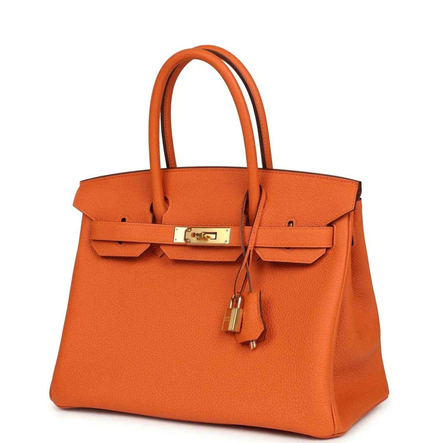 Timeless orange leather handbag with gold hardware, elegant structured design