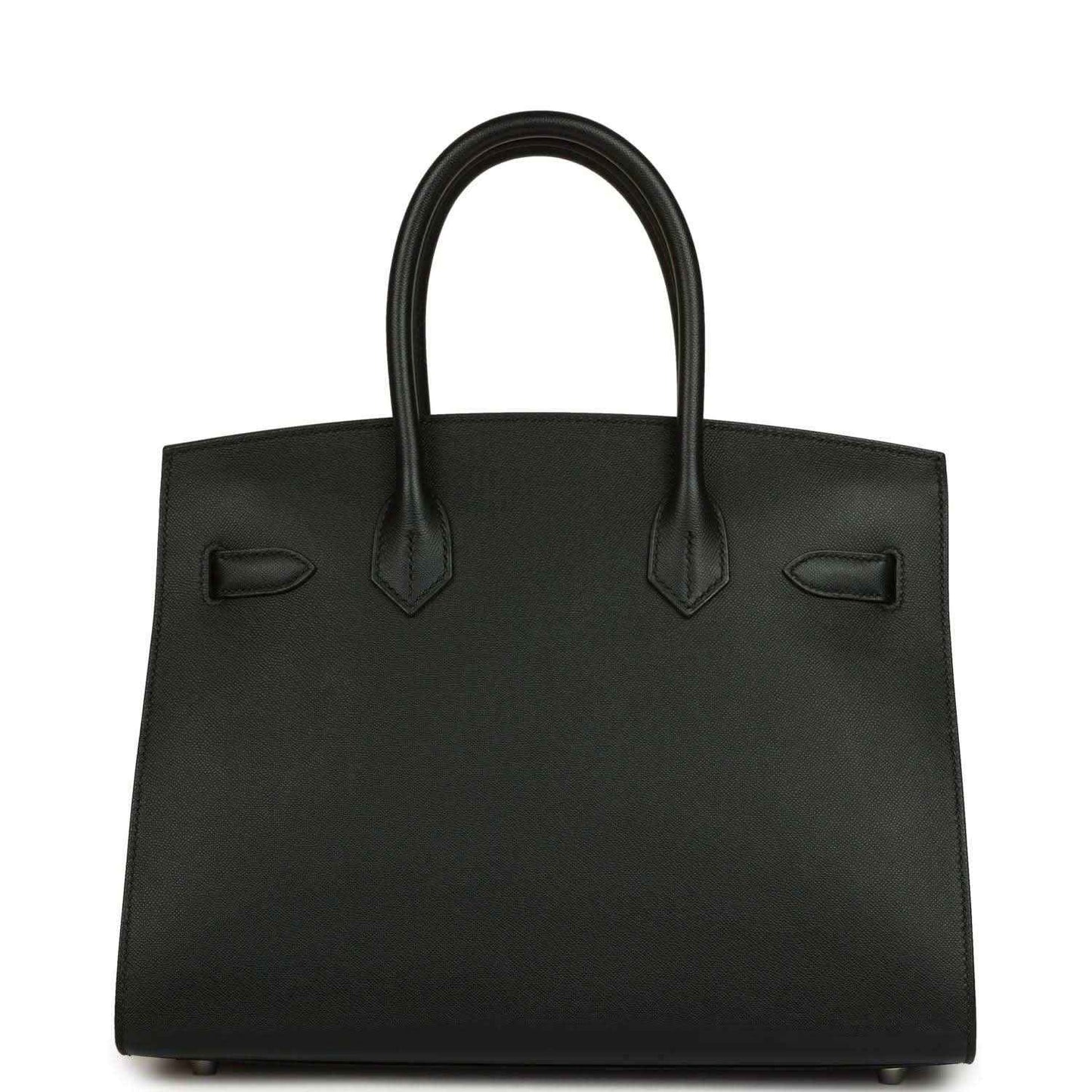 Timeless black leather handbag with elegant structured silhouette and refined finishing.