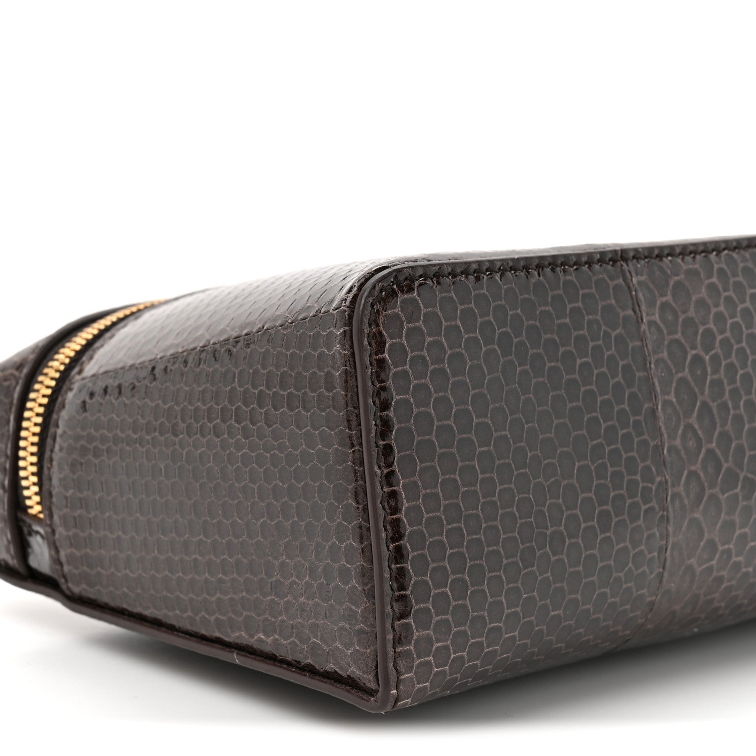 Loro Piana lizard leather pouch corner with gold zipper pull, dark brown finish