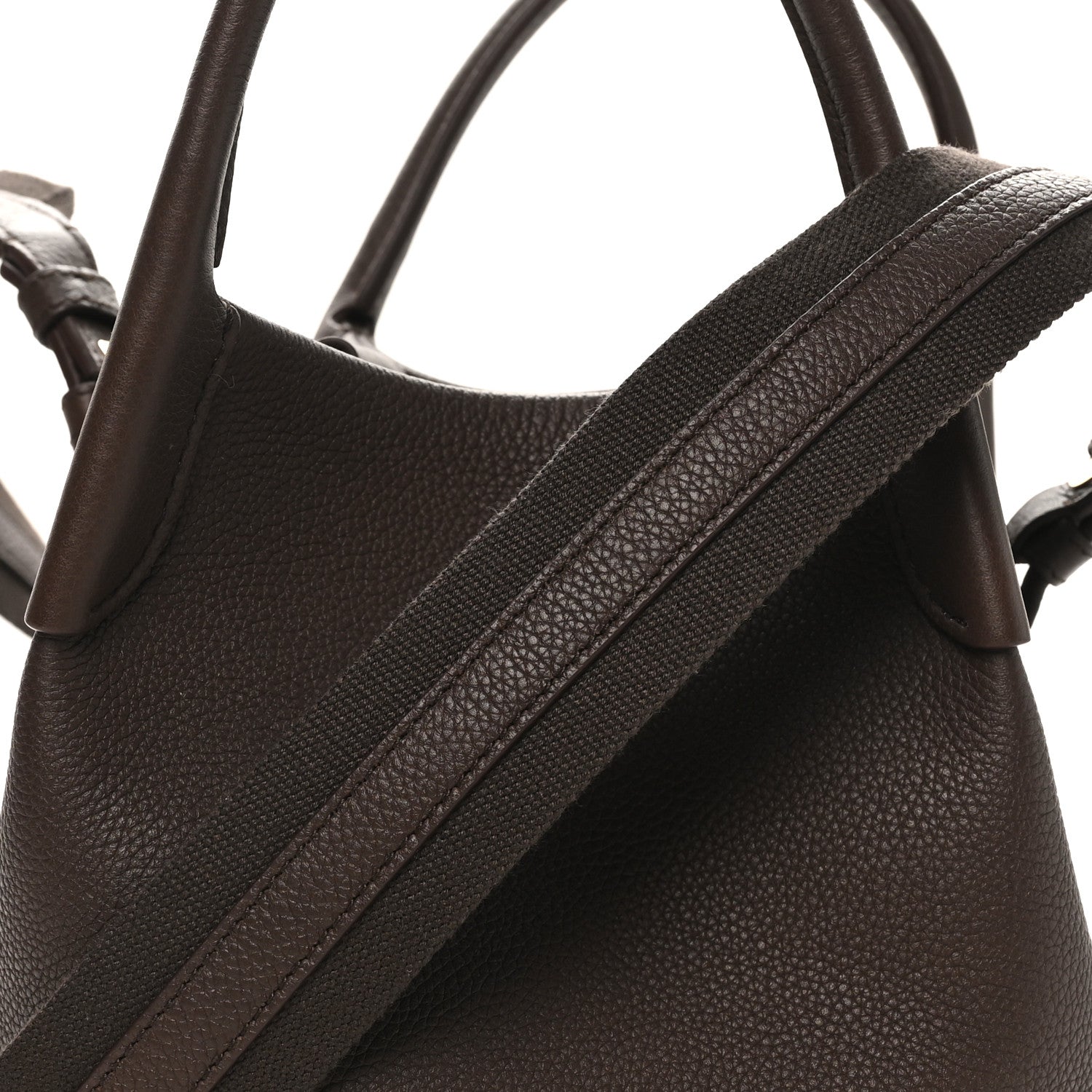 Dark brown grained calfskin small bale bag with textured shoulder strap and top handle