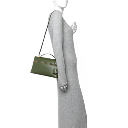 Olive green leather mini handbag with shoulder strap and structured rectangular shape