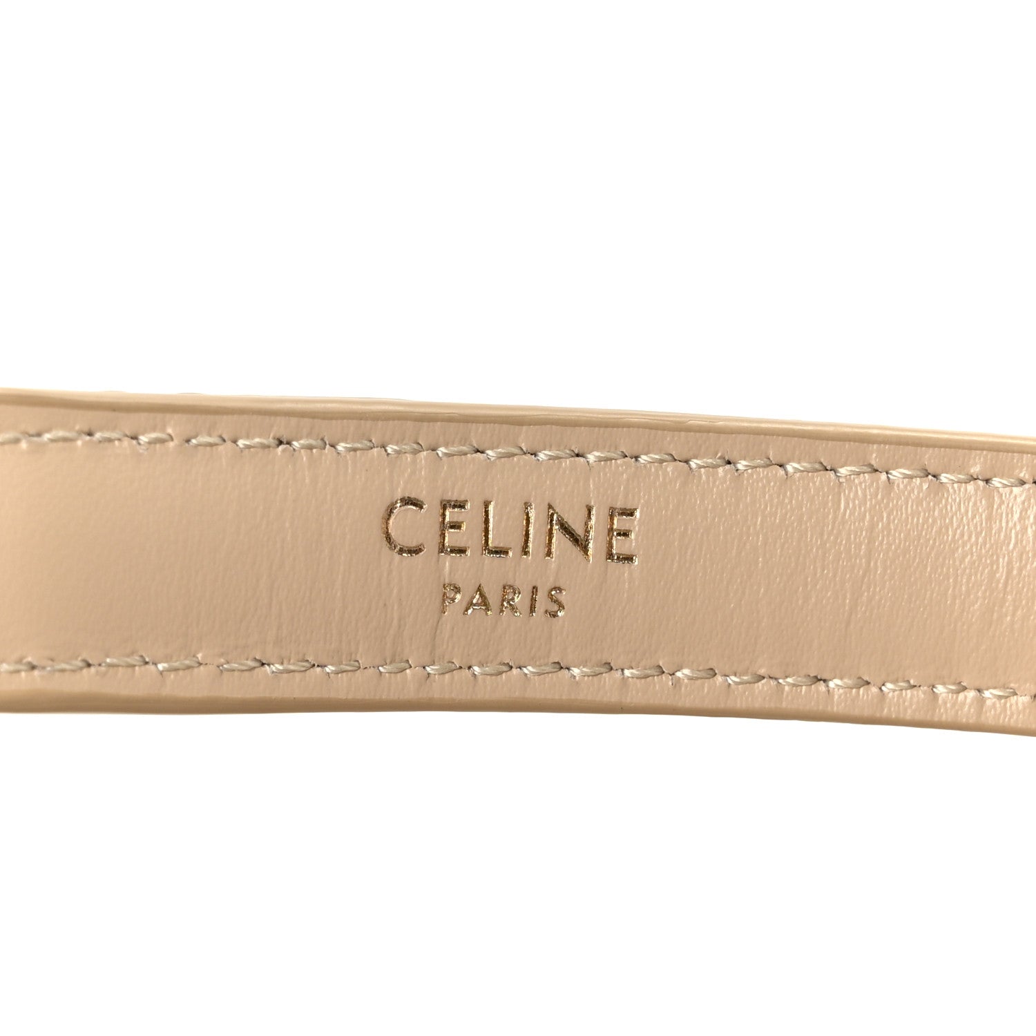 Celine Paris logo on beige leather strap with contrast stitching