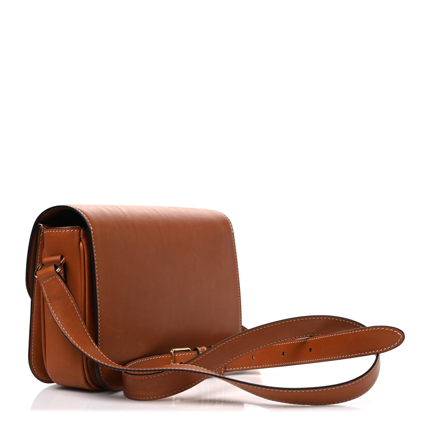 Tan Celine crossbody bag with adjustable strap and front flap close-up, gold hardware.