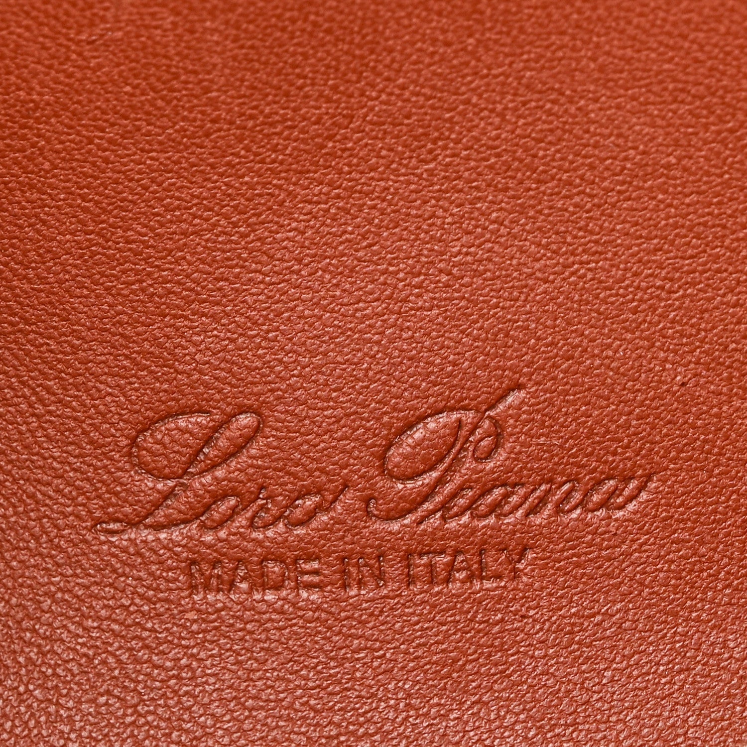 Embossed Loro Piana logo on grained calfskin pouch in brown