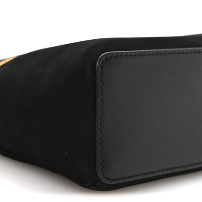 Black pouch corner with stitched rectangular leather patch