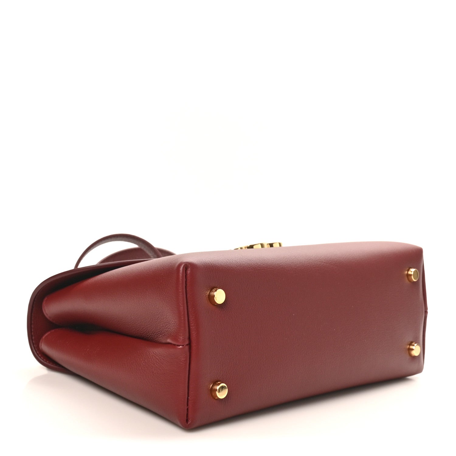 Celine burgundy leather medium bag bottom view with gold studs and short handles
