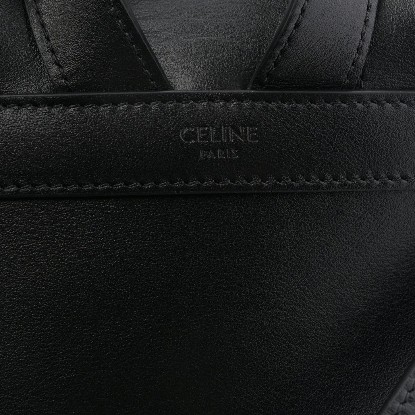 Celine calfskin Bonnie backpack interior panel with 'CELINE PARIS' stamp.