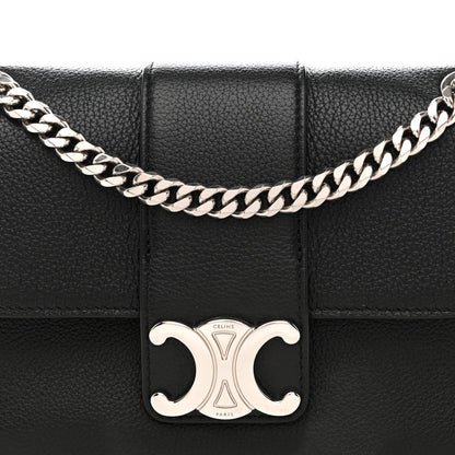 Black leather shoulder bag front with silver C clasp and chain strap