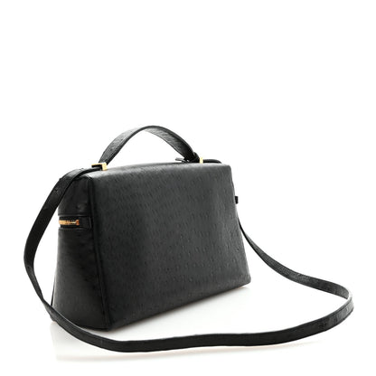 Black ostrich leather satchel-style mini handbag with top handle and long crossbody strap