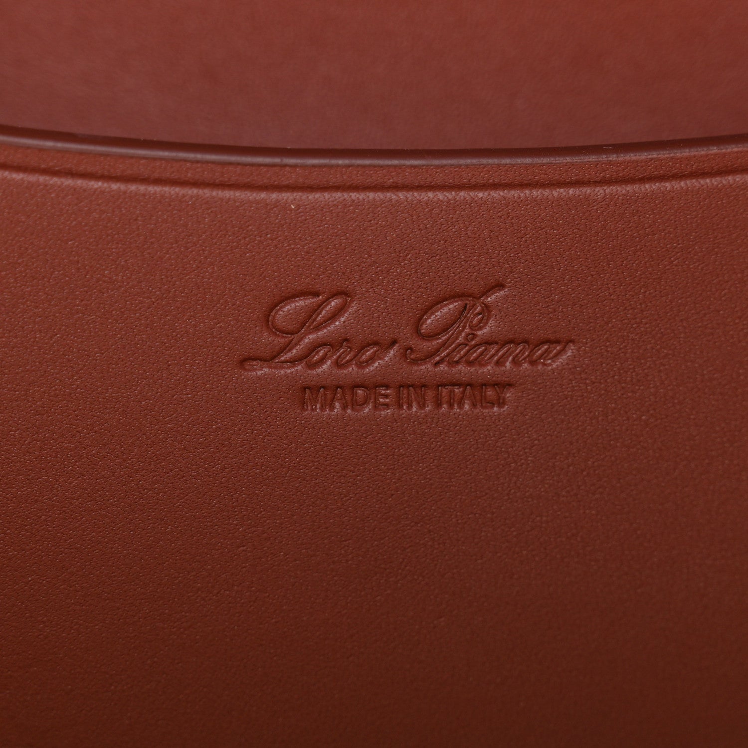 Loro Piana embossing and Made in Italy on dark brown calfskin