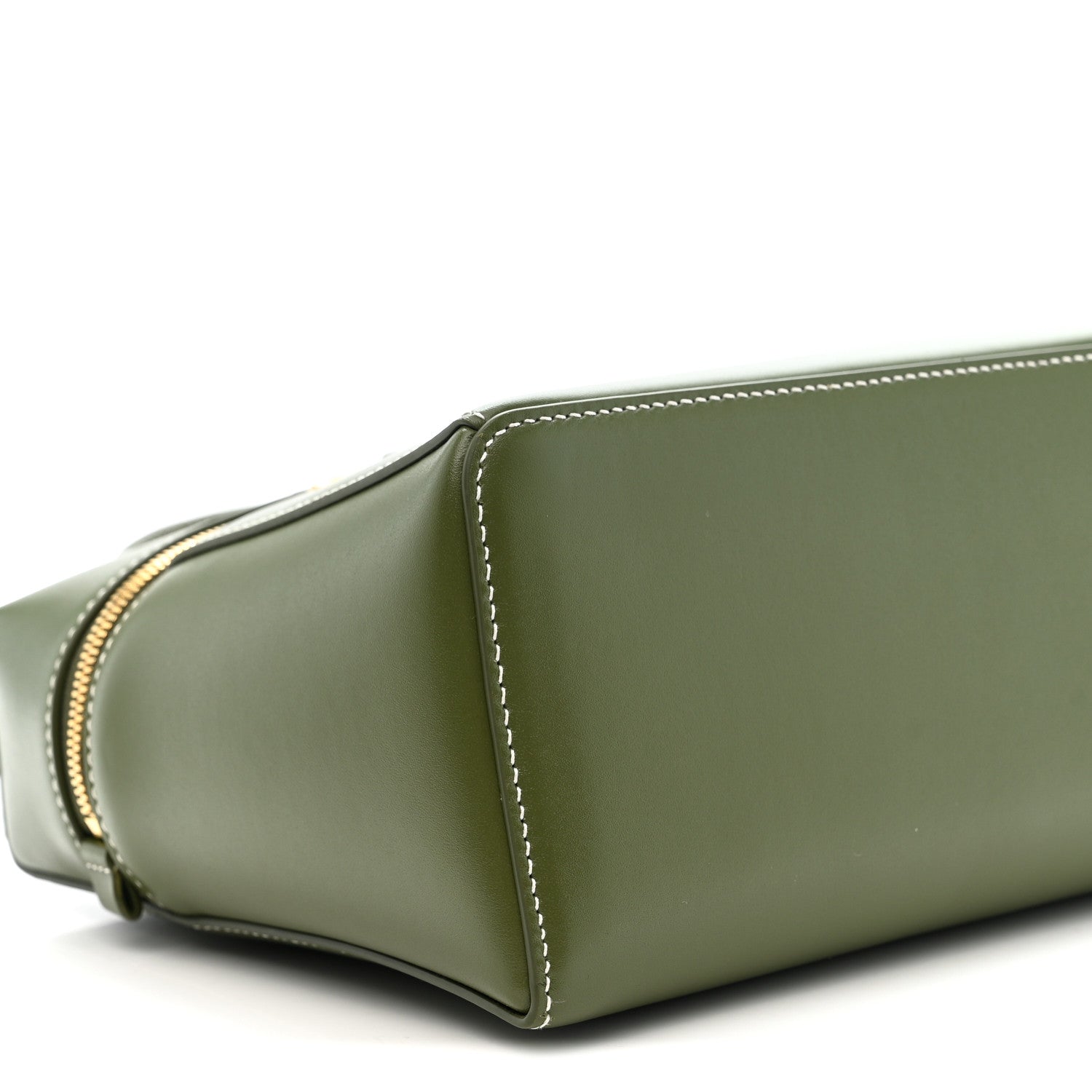 Olive green leather handbag side panel with curved seam and contrast edge stitching