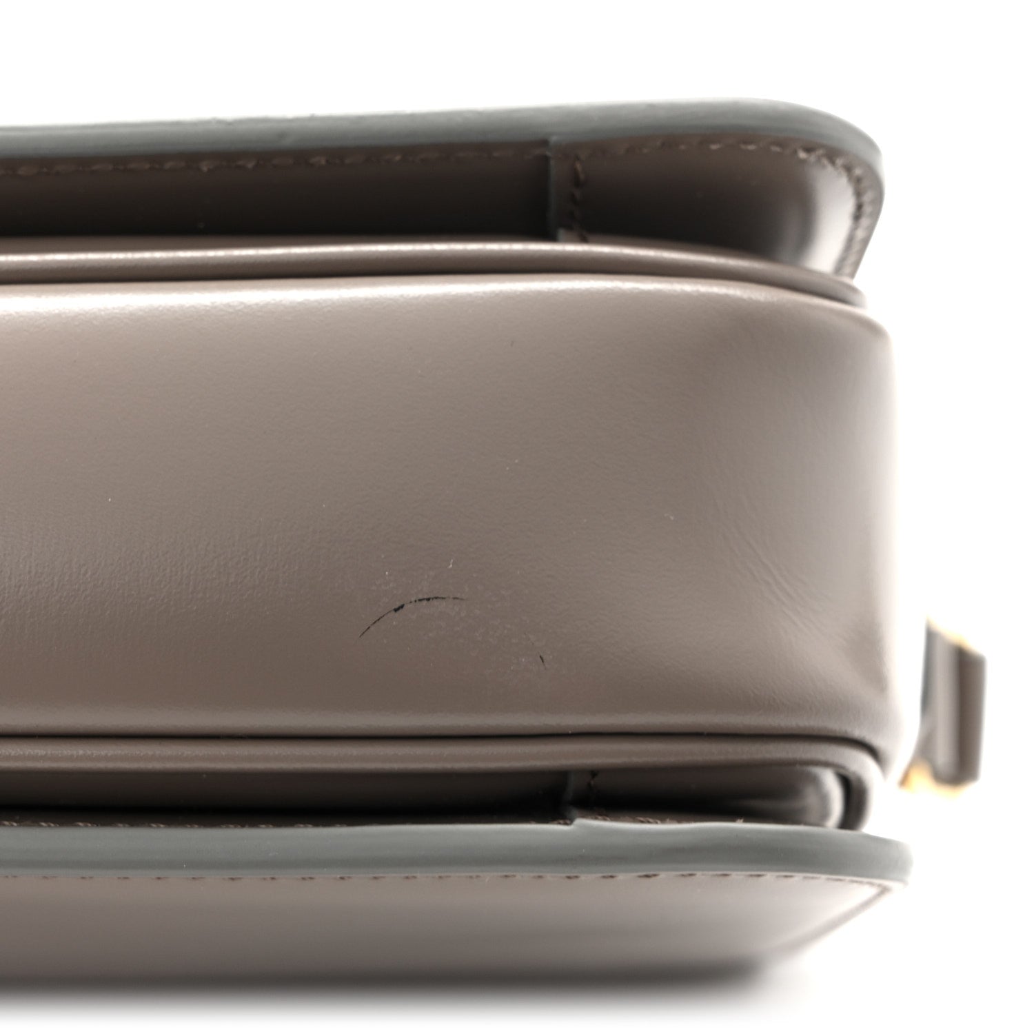 Shiny calfskin shoulder bag with top seam and dark brown finish, close-up
