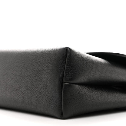 Black calfskin shoulder bag, close-up of side seam and curved corner