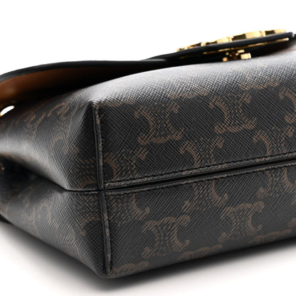 Celine Triomphe shoulder bag back corner close-up with gold hardware and dark canvas texture