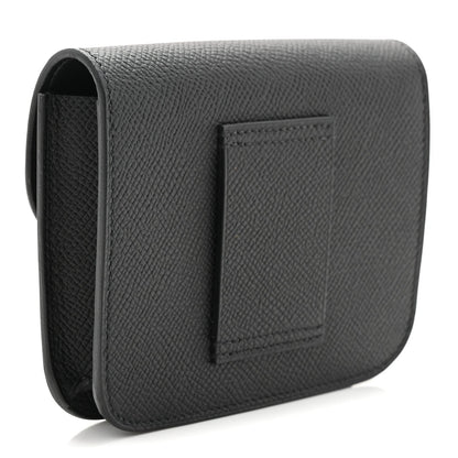 Black crossbody-style wallet with textured leather and rear tab pocket