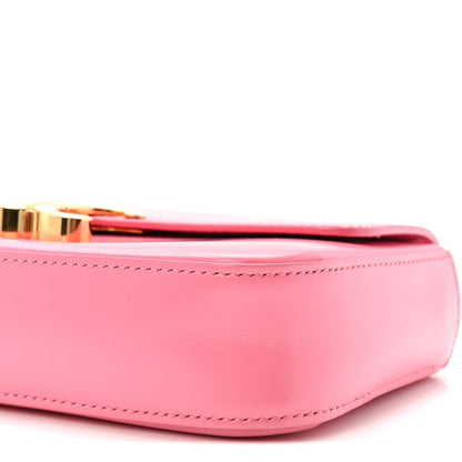 Flamingo pink leather corner with contrast stitching and curved base