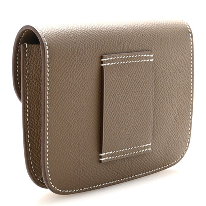 Hermes Constance slim wallet with card slot view, textured brown leather and stitched edges