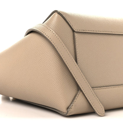 Celine light taupe micro belt bag corner close-up with belt and flap seam