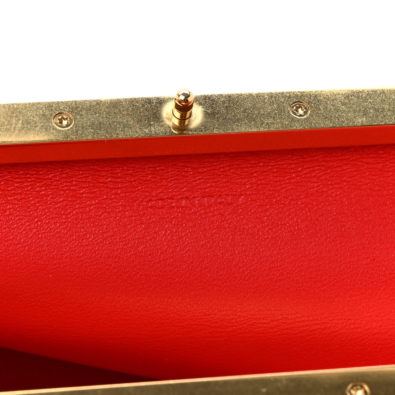 Black leather rectangle bag clasp and gold-tone hardware detail