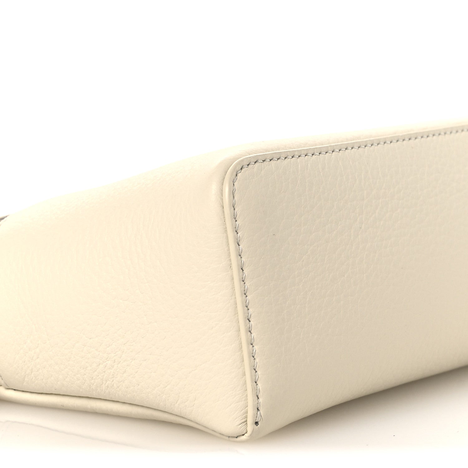 White grained calfskin pouch with stitched corner and rounded bottom edge