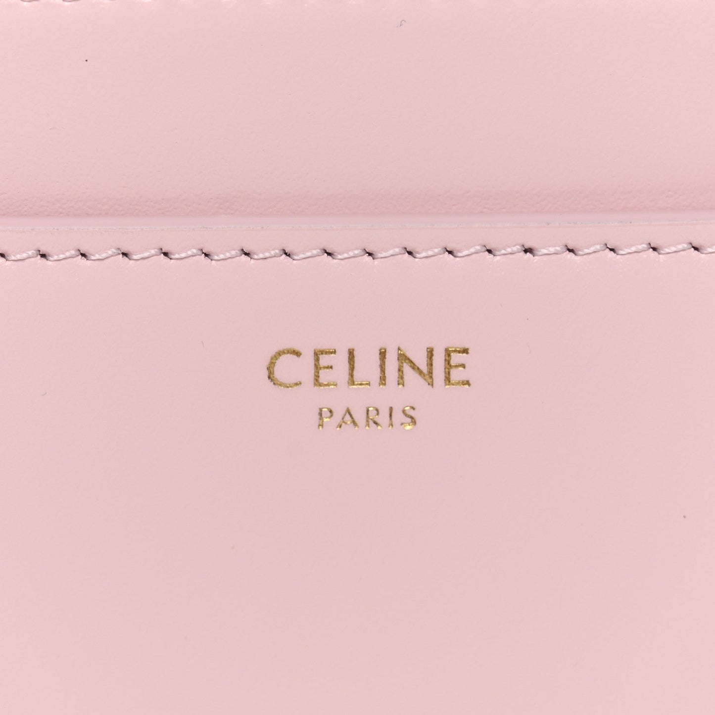 Pastel pink leather mini bag panel with CELINE PARIS embossed logo