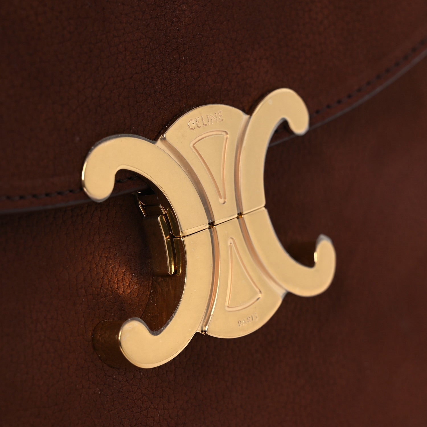 Chestnut leather bag clasp with gold Celine logo medallion hardware