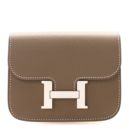 Hermes Constance slim wallet in taupe leather with cream H clasp and flap