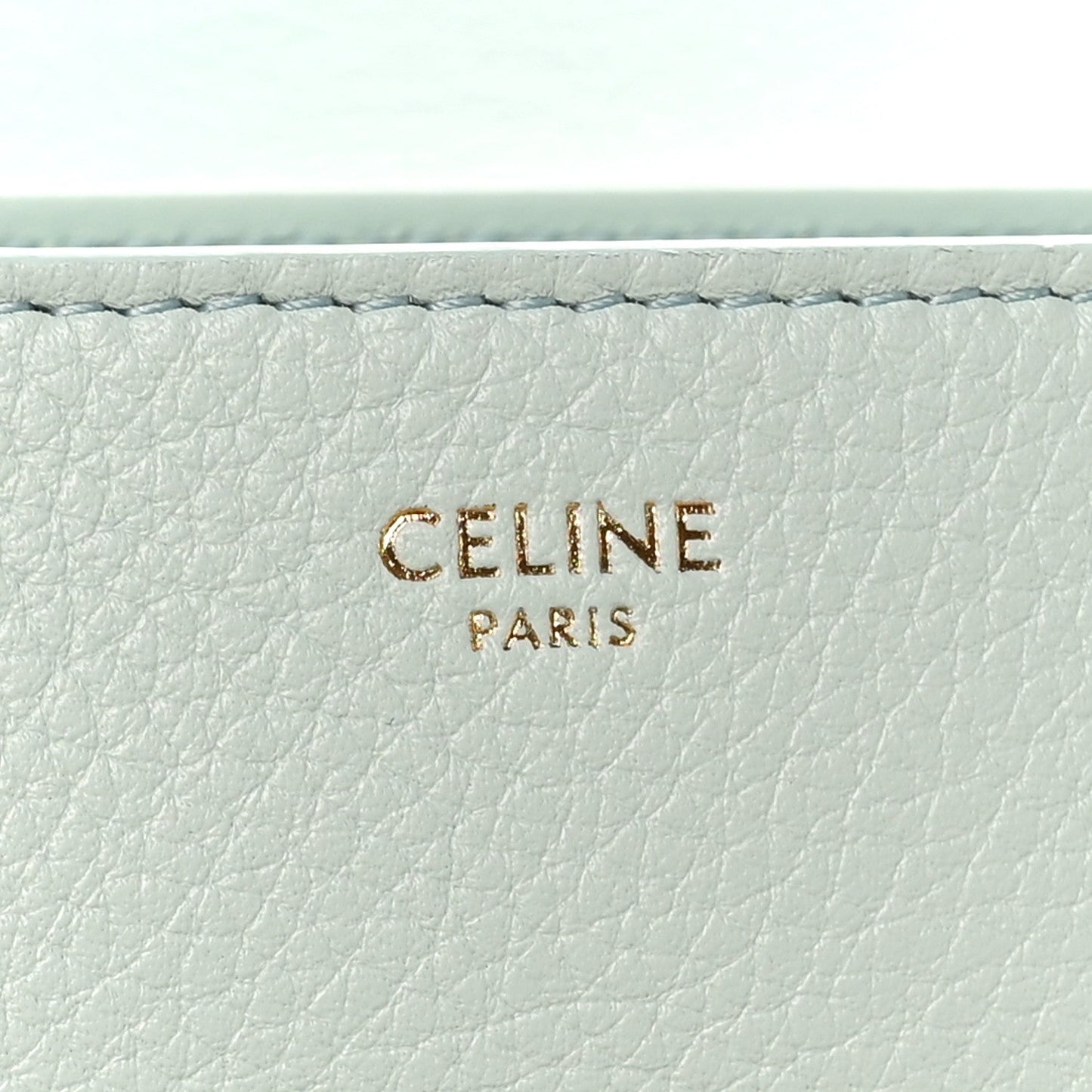 Celine Paris embossing on light blue grained leather lining