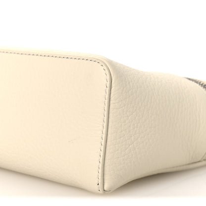 White grained calfskin pouch corner with neat topstitched edge, close-up