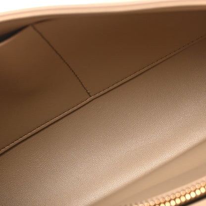 Beige grained leather interior edge with topstitching